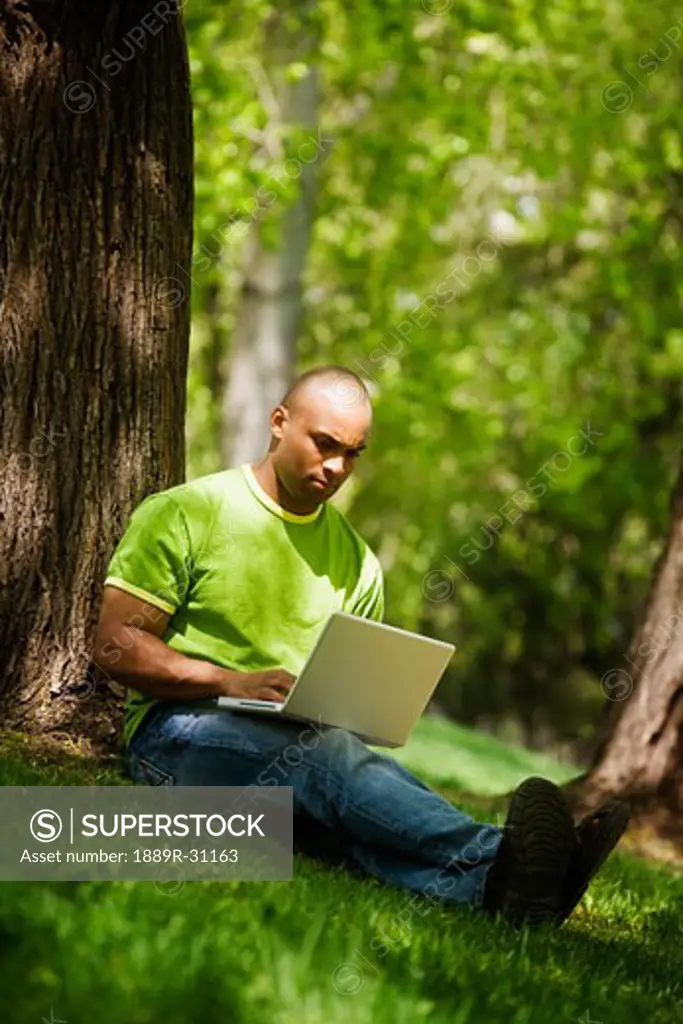 Man working on laptop computer
