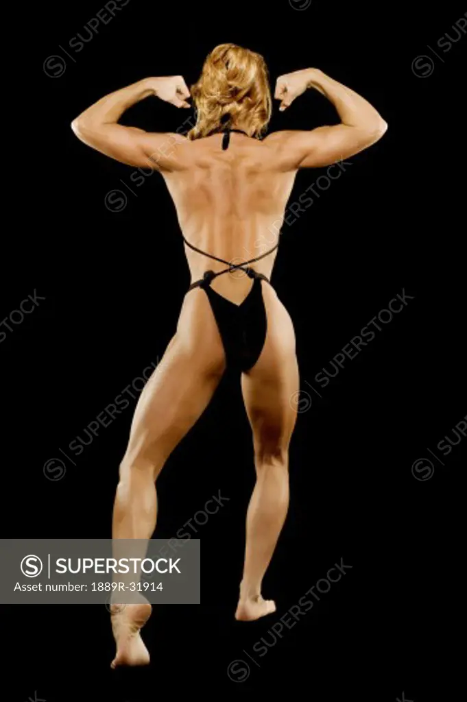 Back view of a female bodybuilder