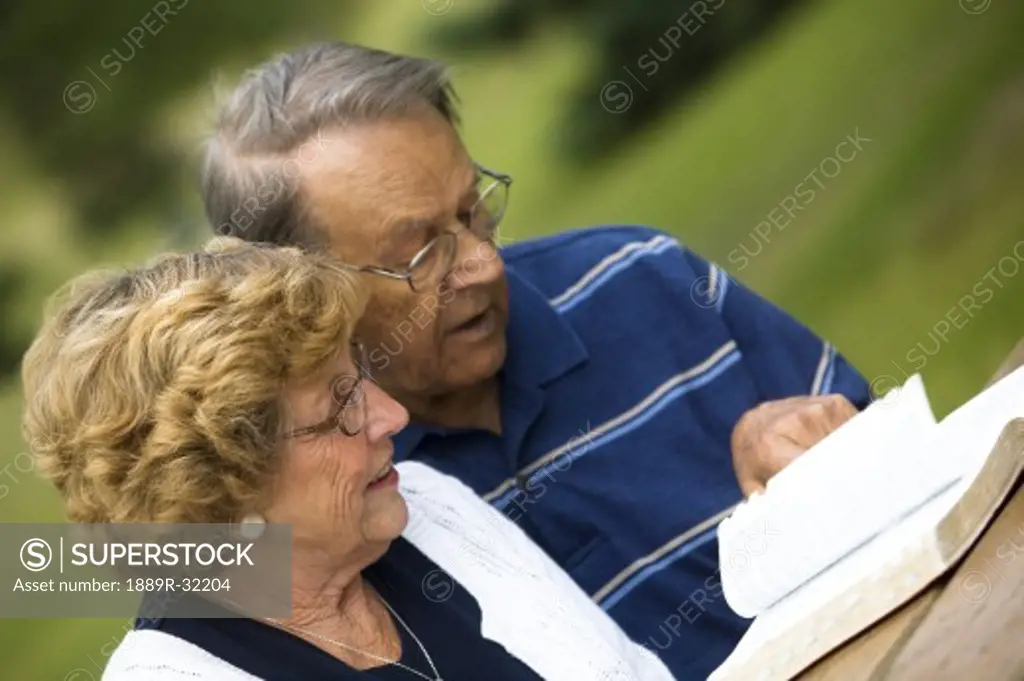 Senior couple reading the Bible