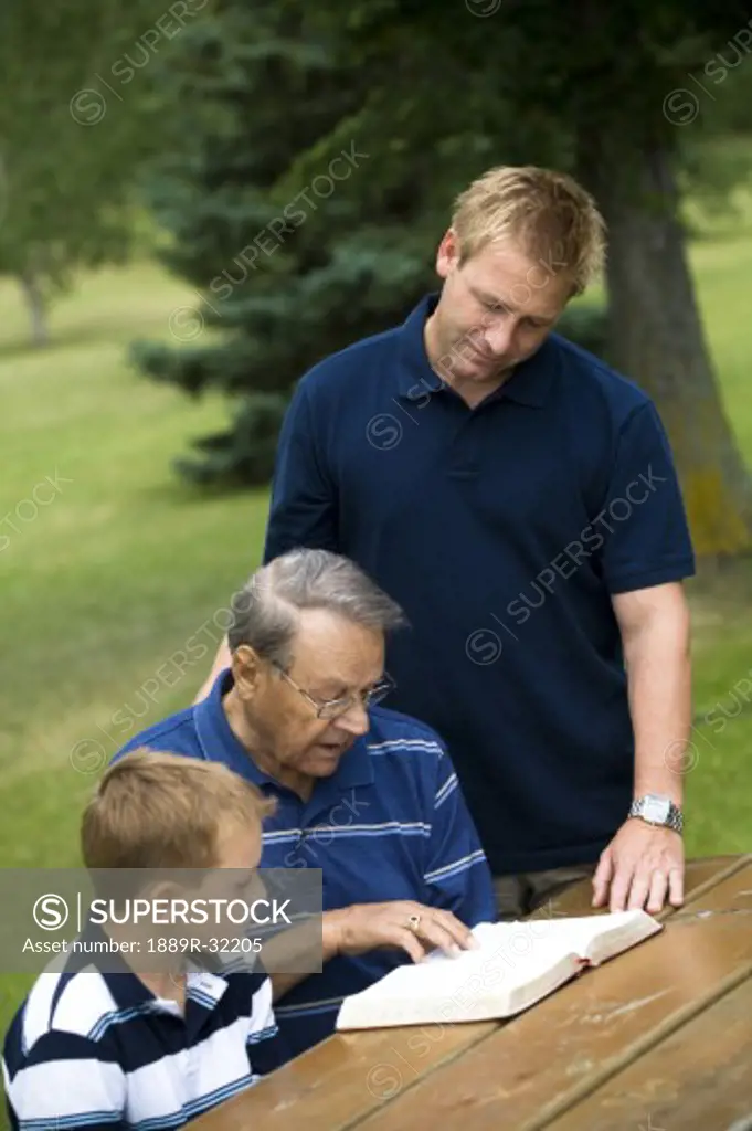Three generations reading the Bible