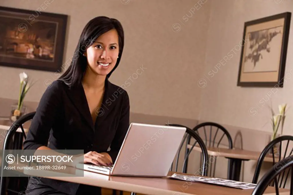 A woman with a laptop