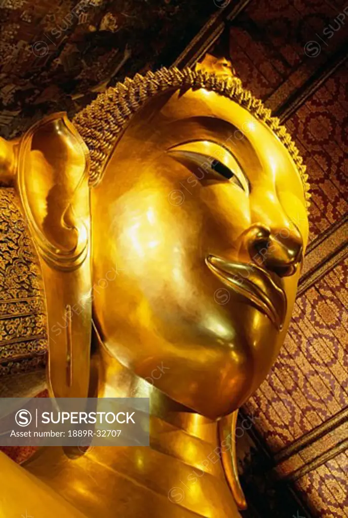 Head of Reclining Buddha at Wat Po, Bangkok, Thailand