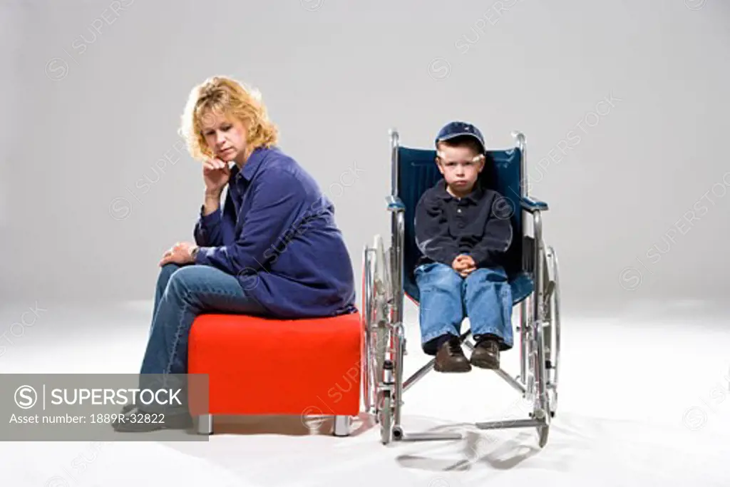 Mother with son in wheelchair
