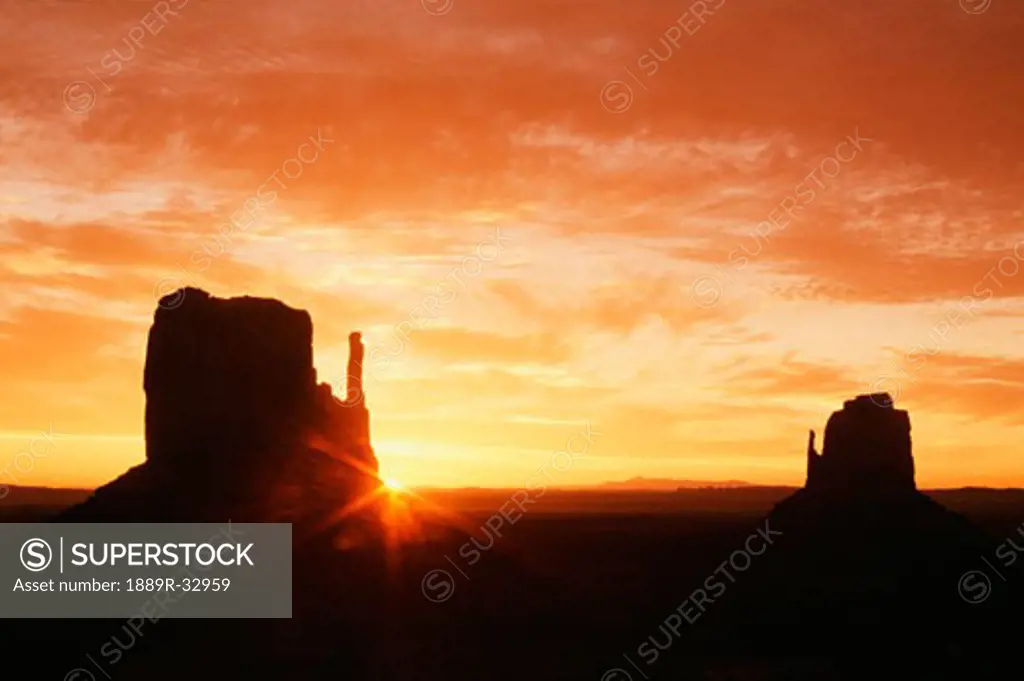 The Mittens at sunrise, Monument Valley Navajo Tribal Park, Arizona, United States of America