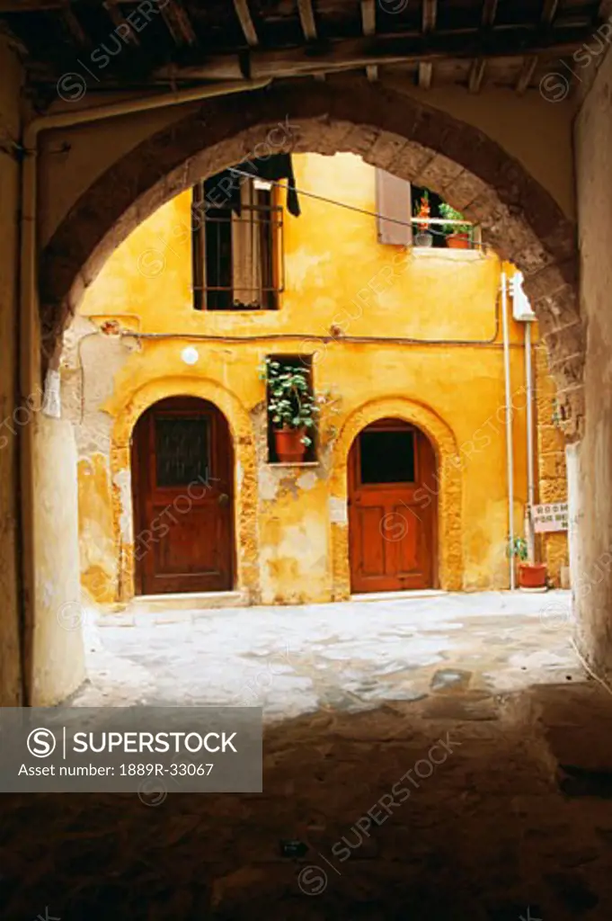 Arched entrance to courtyard, Hania, Crete, Greece