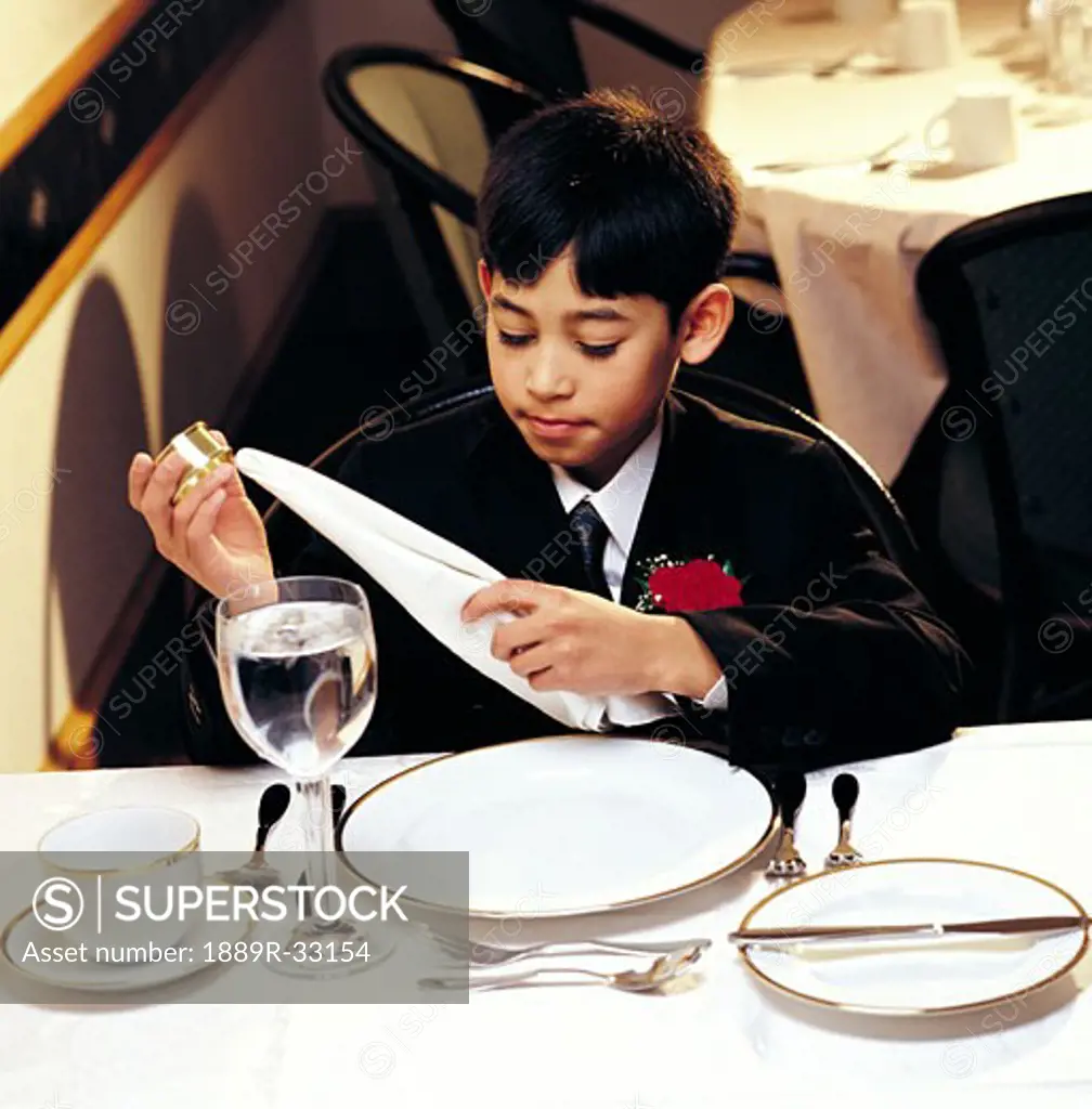 A boy at a wedding reception