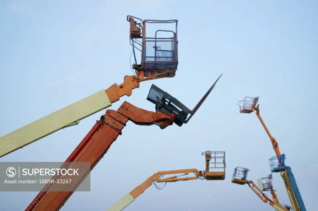 A group of boom lifts
