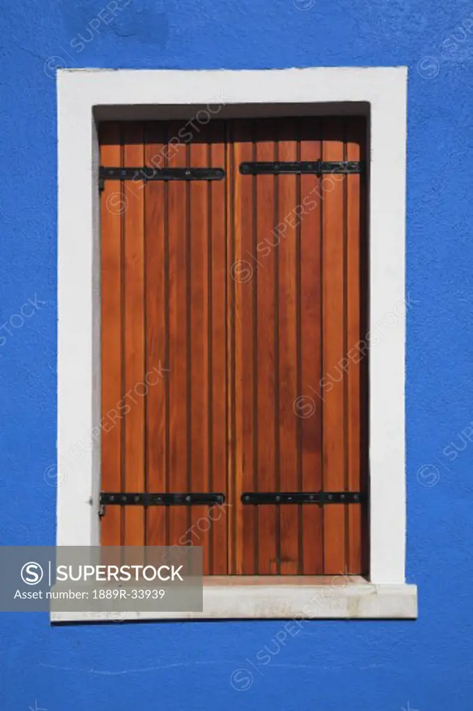 Wooden shuttered window, Burano, Italy  