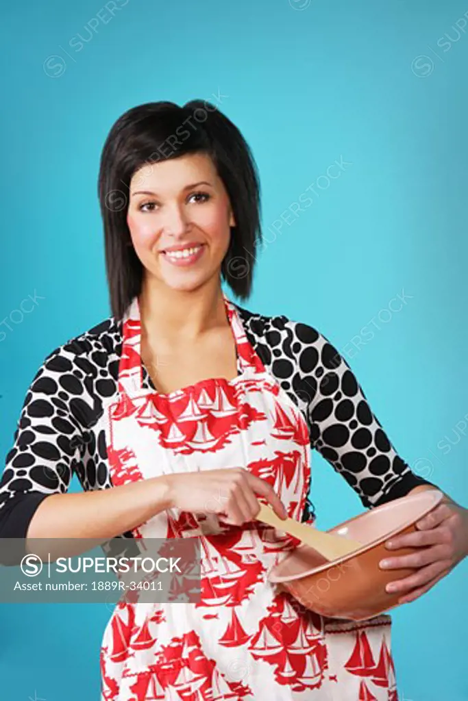 Woman holding mixing bowl