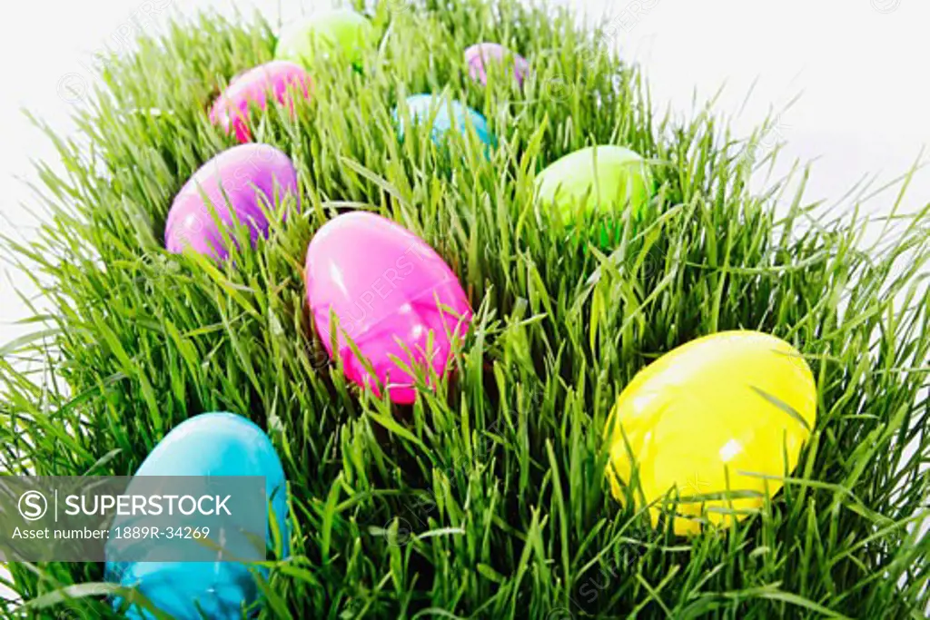 Colored eggs in a patch of grass