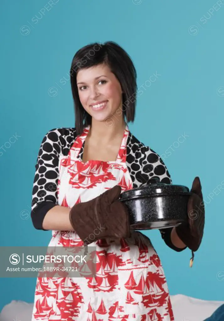Woman holding a roaster