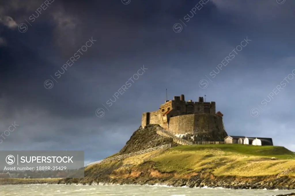 Lindisfarne Castle on a volcanic mound called Beblowe Craig, Holy Island, Bewick, England