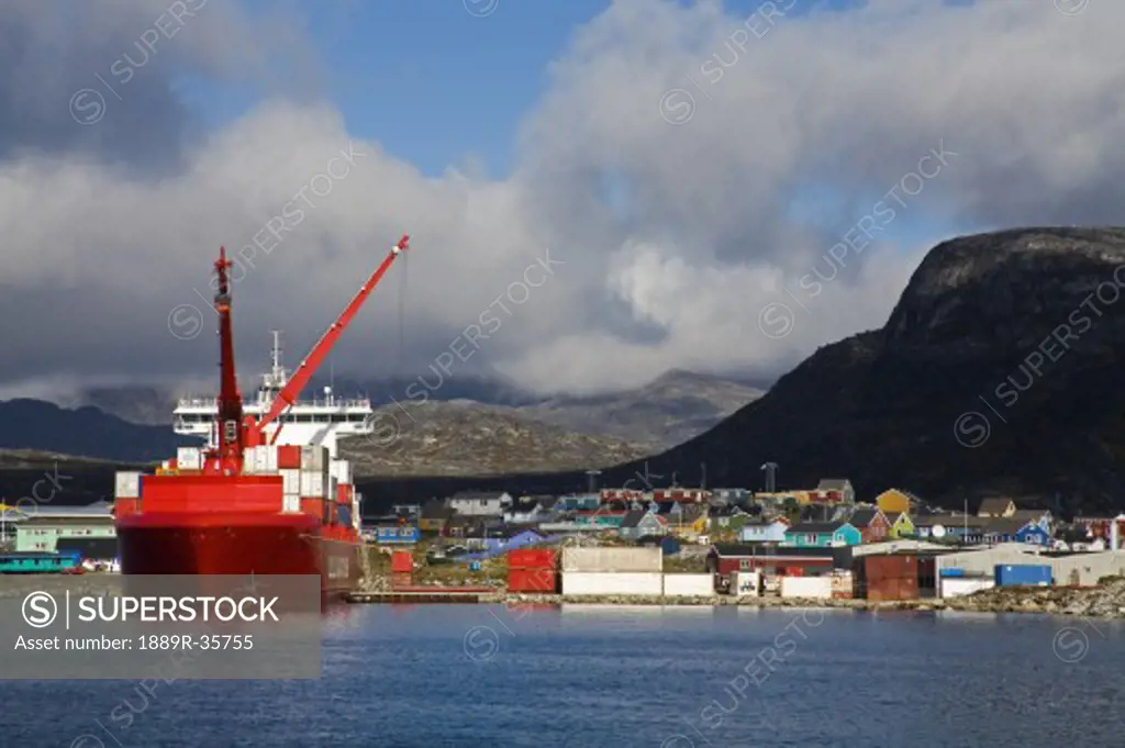 Container ship unloading at Nanortalik Port, Island of Qoornoq