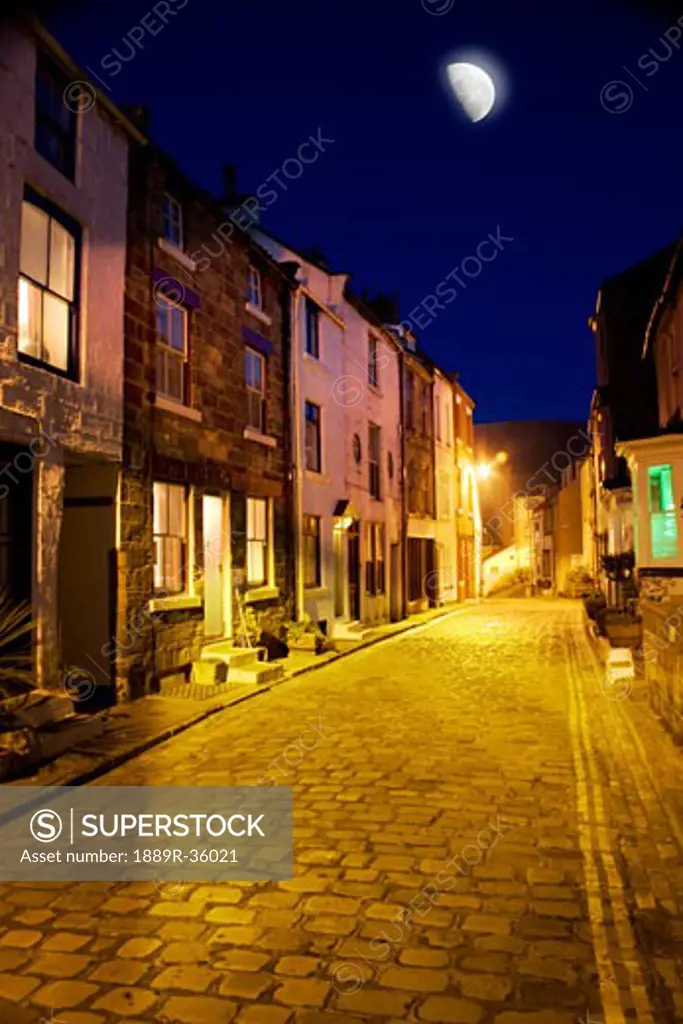City street at night, Staithes, Yorkshire, England