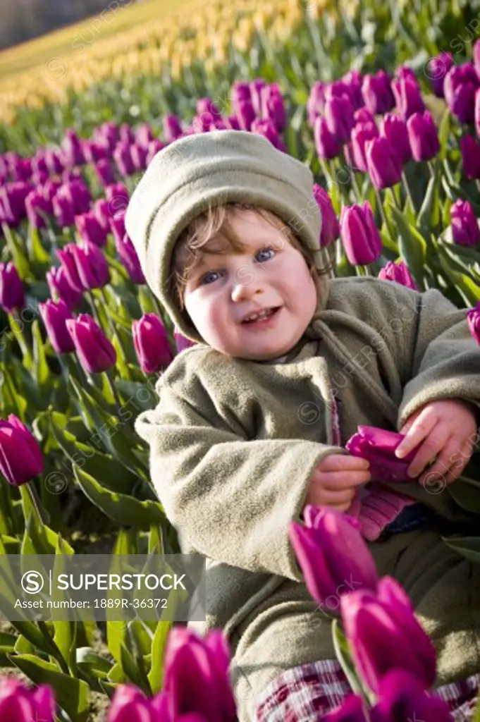Girl holding a tulip
