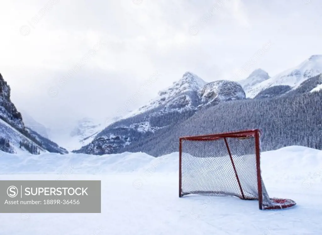 Hockey goal on frozen lake, Lake Louise, Banff, Alberta, Canada
