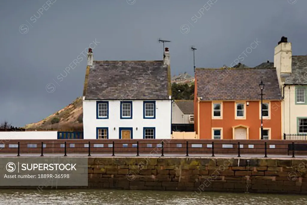 Houses on waterfront, Maryport, Cumbria, England
