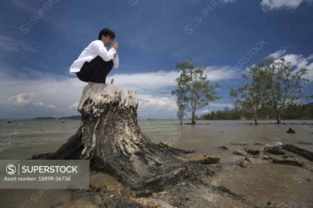 Man praying, Koh Lanta, Thailand