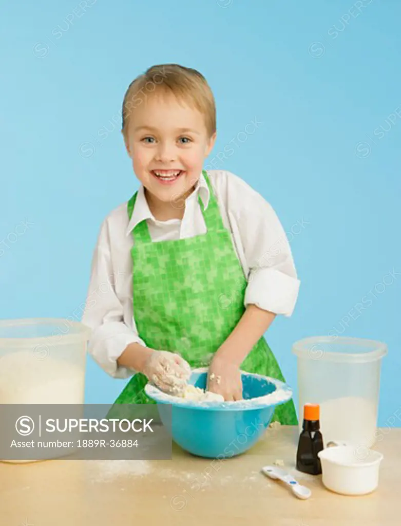 Boy mixing ingredients