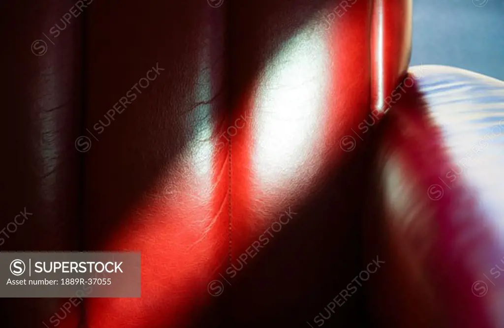 Sun shining on a leather couch