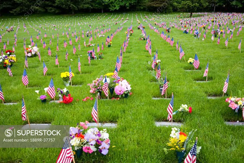Memorial flowers and flags, graveyard in Oregon, USA