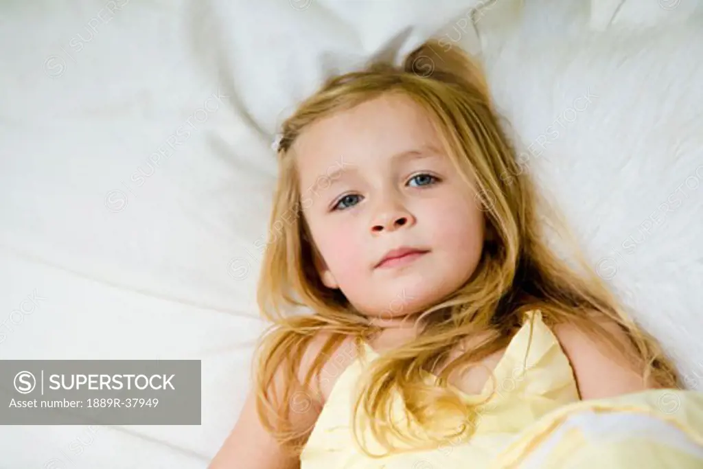 A girl lying in bed