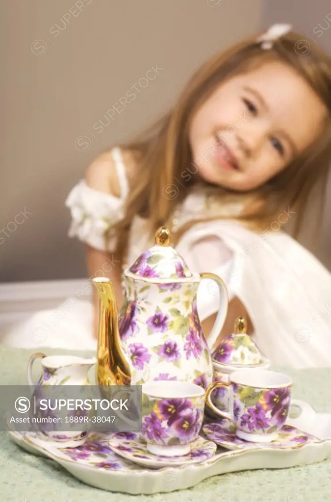 Girl with tea set