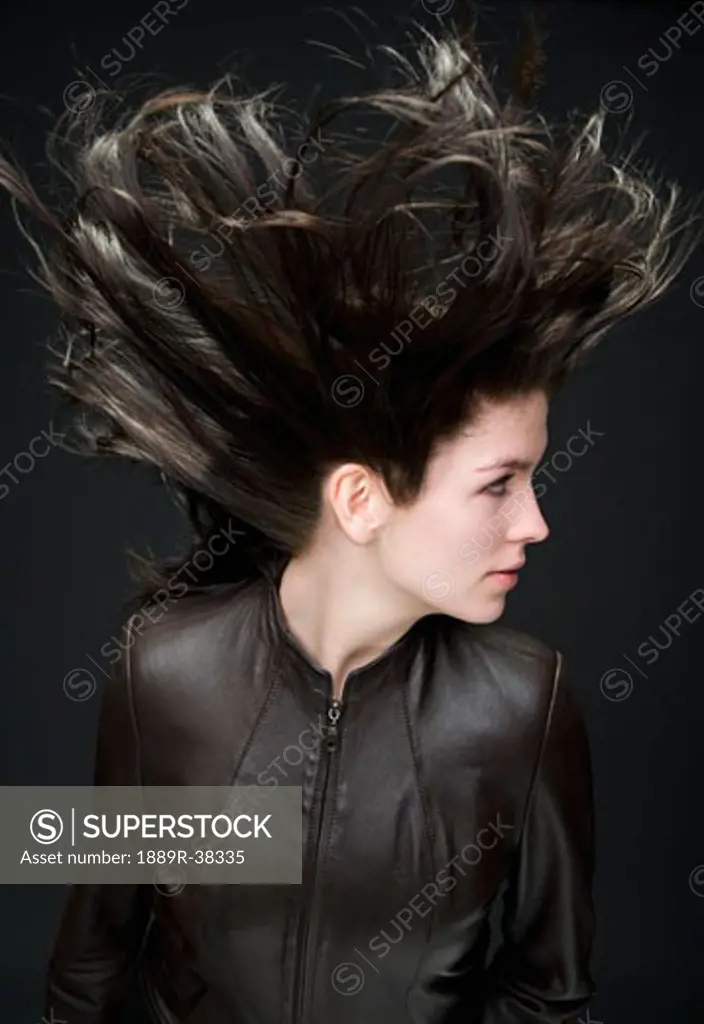 Woman with wind blown hair
