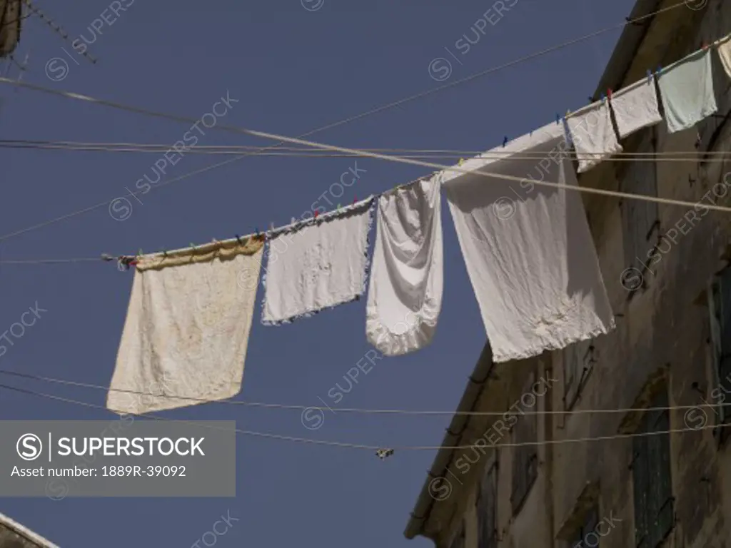 Laundry hanging from a line, Corfu, Greece