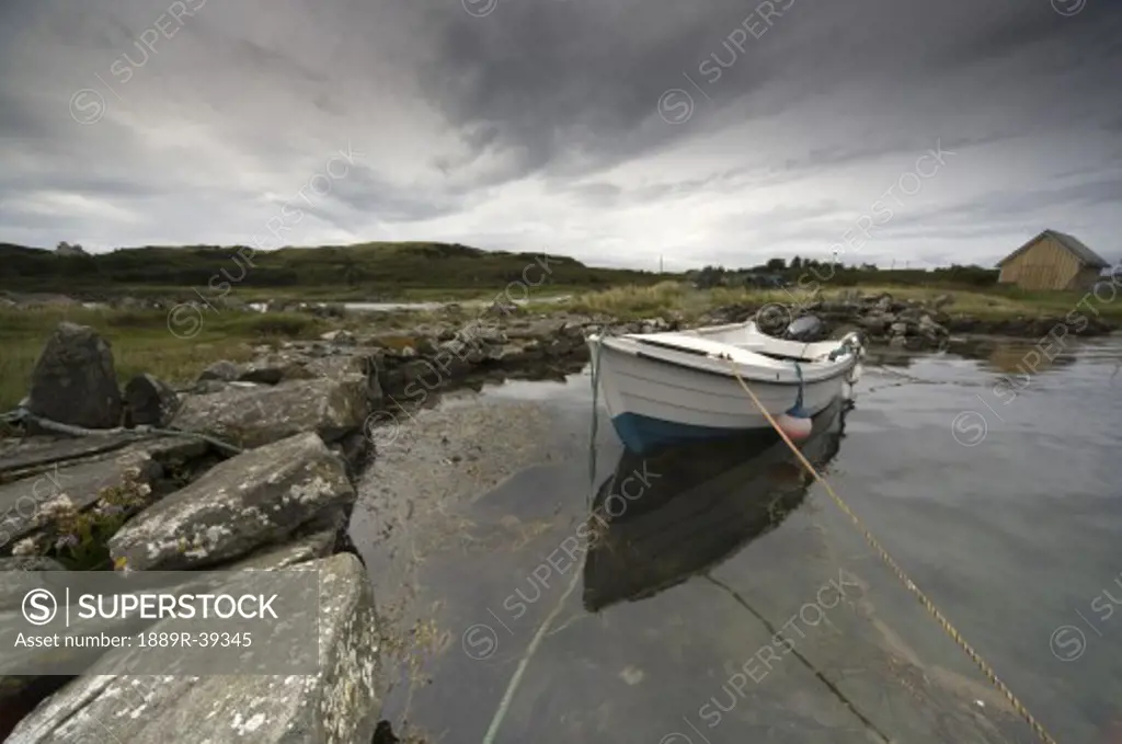 Boat tied to the shore