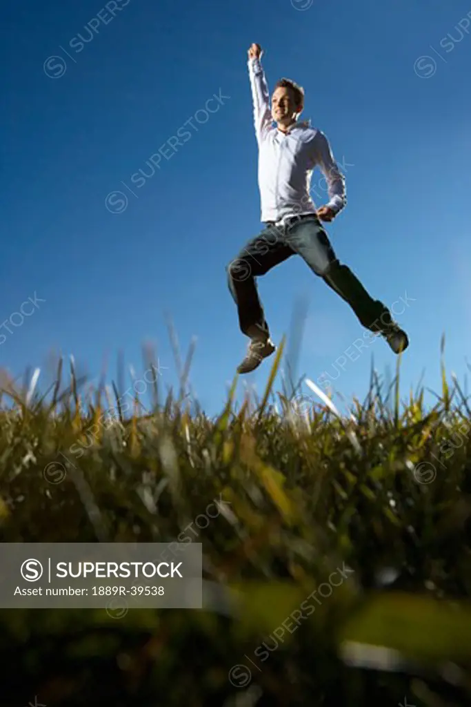 Boy jumping for joy