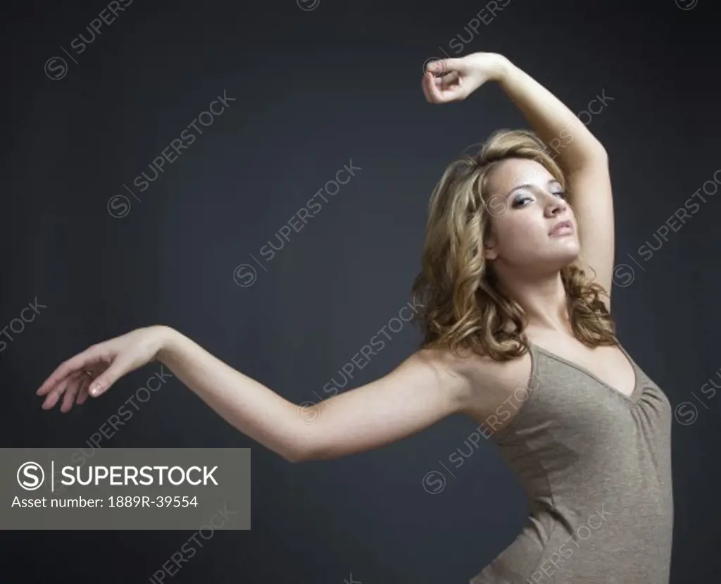 Woman with raised arms