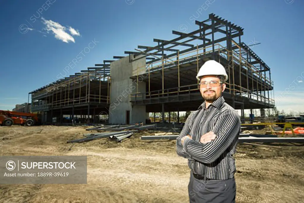 Man in hardhat at construction site