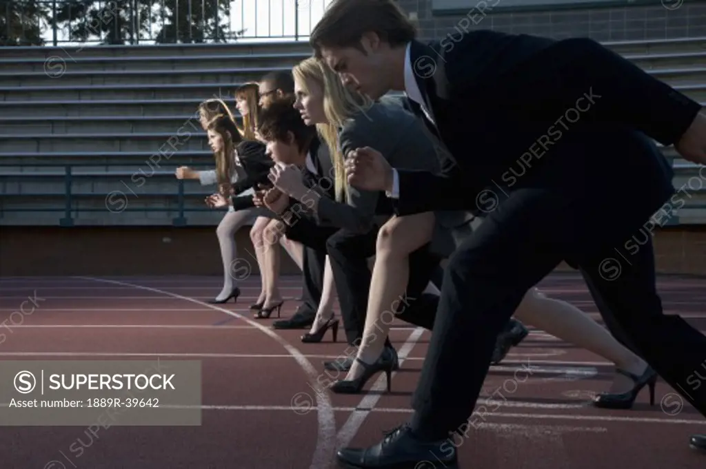 Business-people on a racetrack