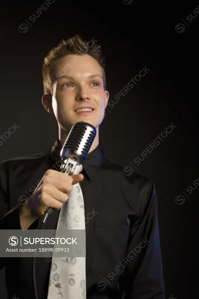 Young man with a microphone