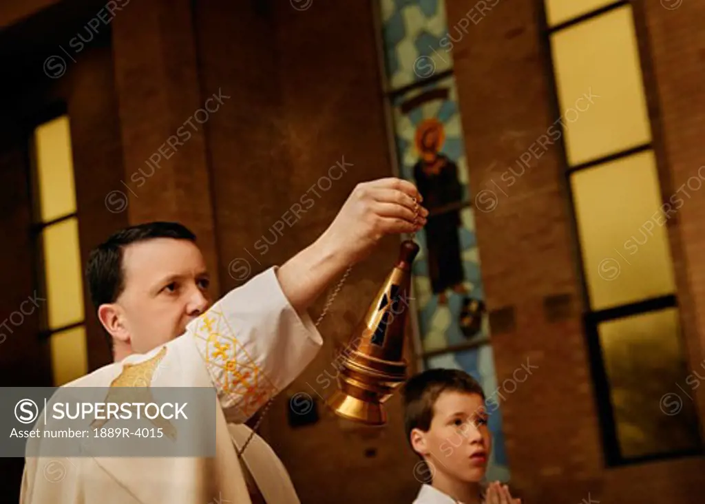 Priest performing Catholic ritual