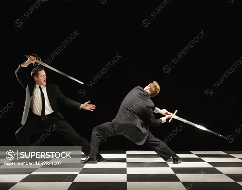 Two businessmen in a sword fight