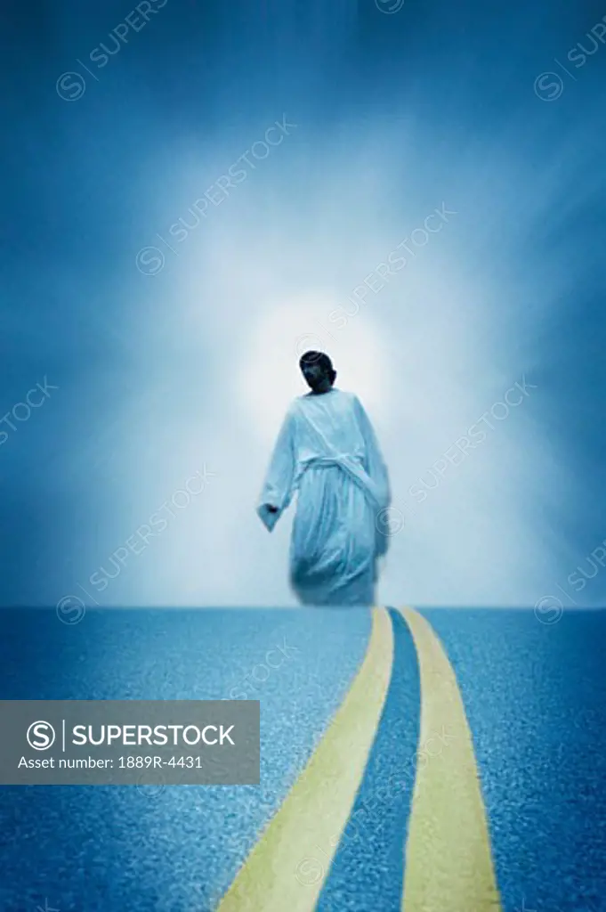 Jesus walks along a modern road