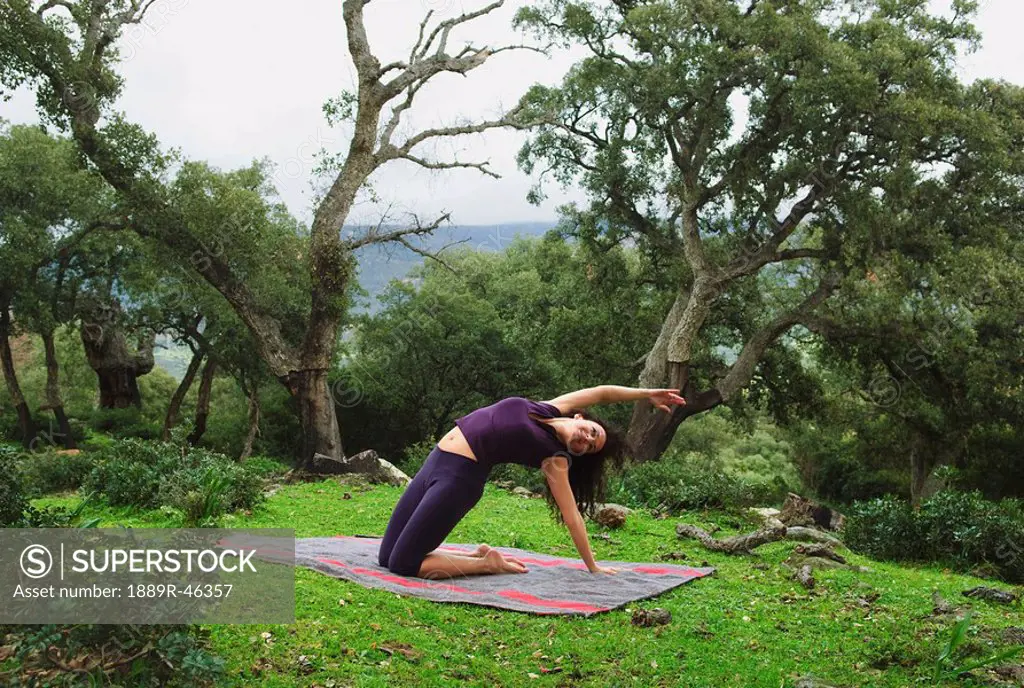 Woman doing yoga stretches