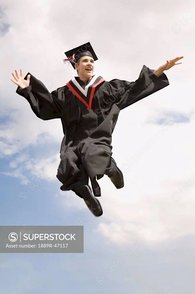 Graduate jumping high