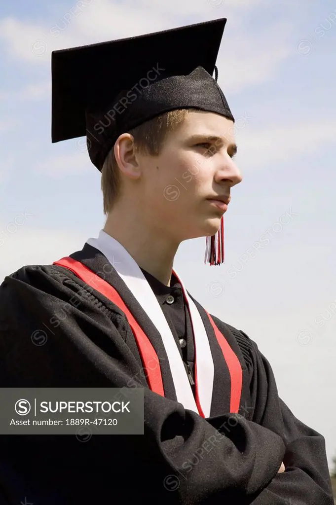 Graduate looking into the distance