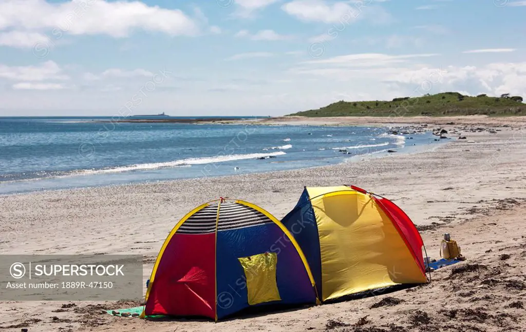 Tent on the beach, Northumberland, England