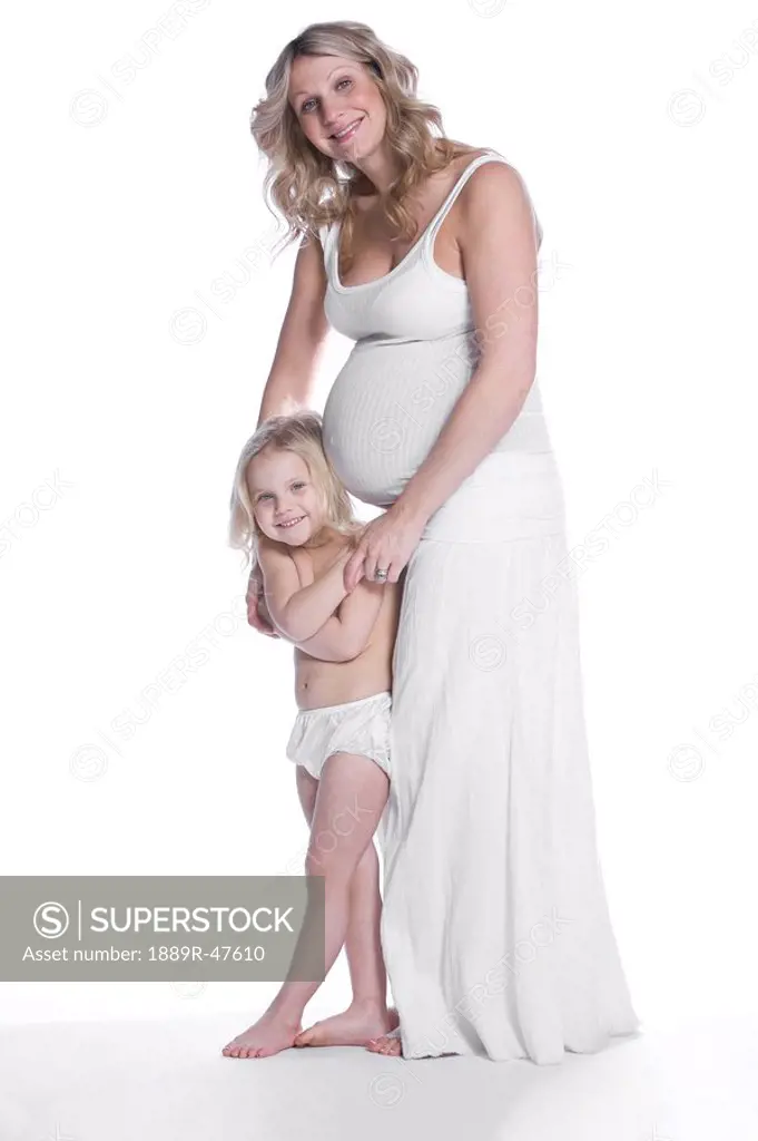 Pregnant mother and daughter