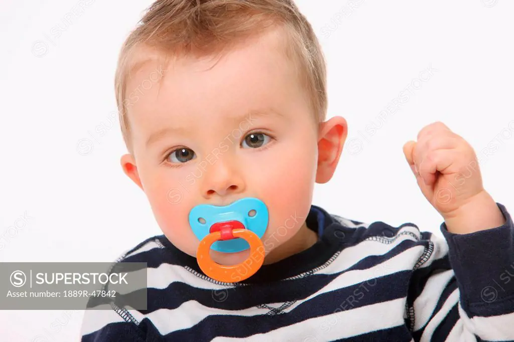 Little boy with a soother