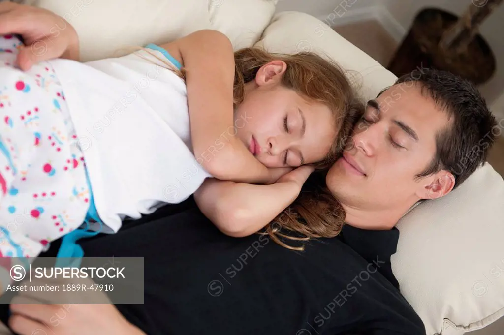 Father and daughter napping