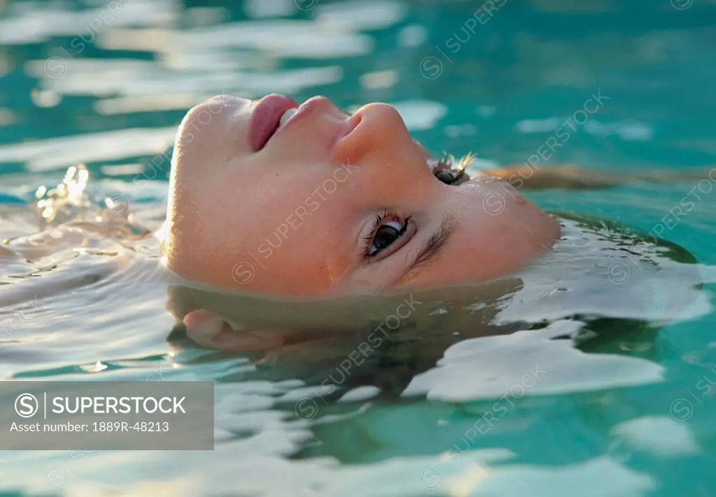 Girl floating in the water