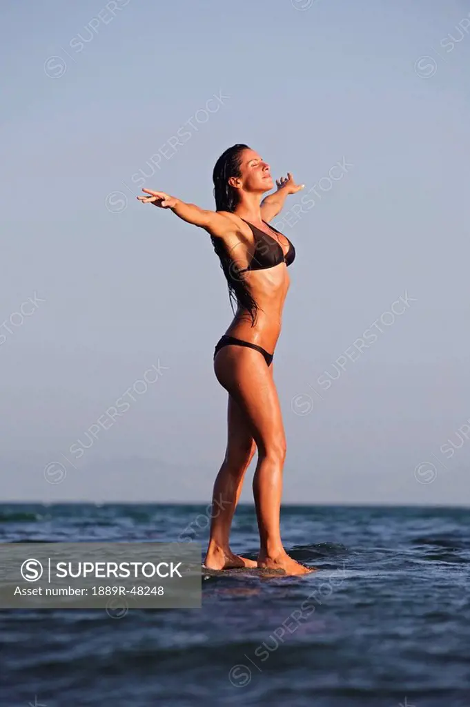 Woman standing on the water
