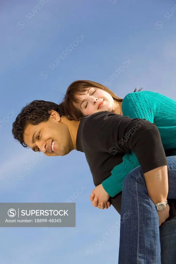 Young happy interracial couple in love
