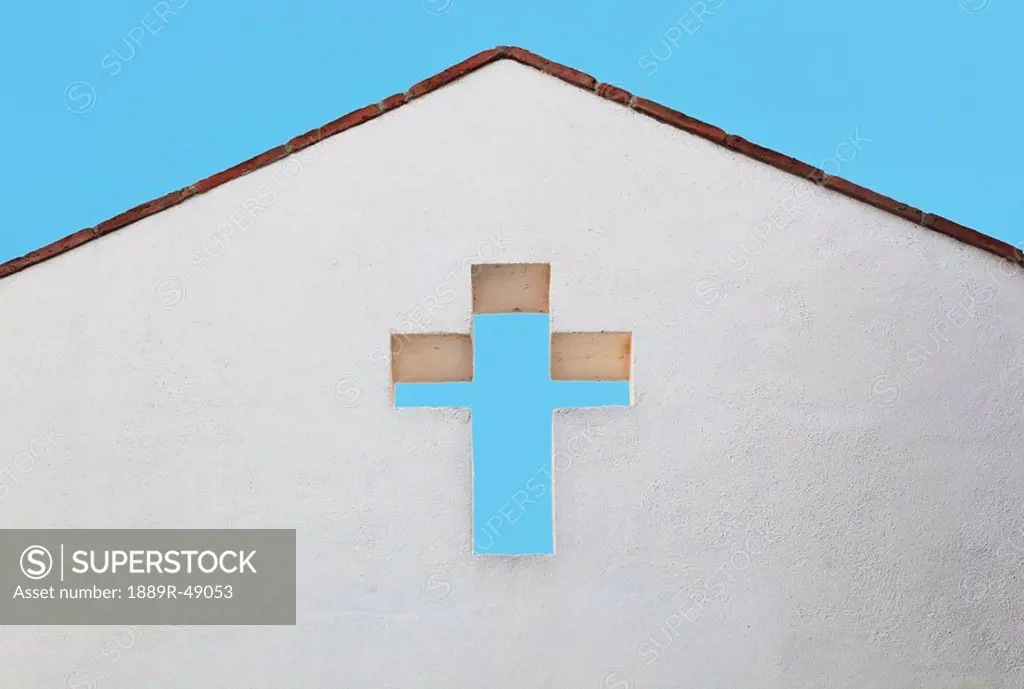 Cross in a white wall