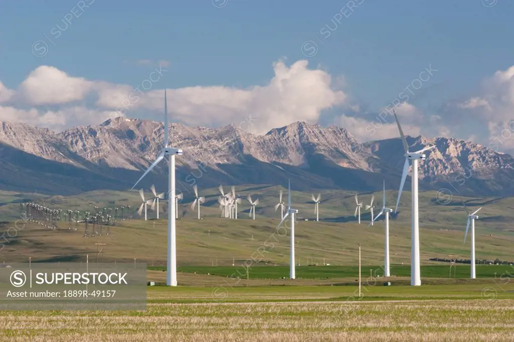 wind farm and mountains, southern alberta, canada